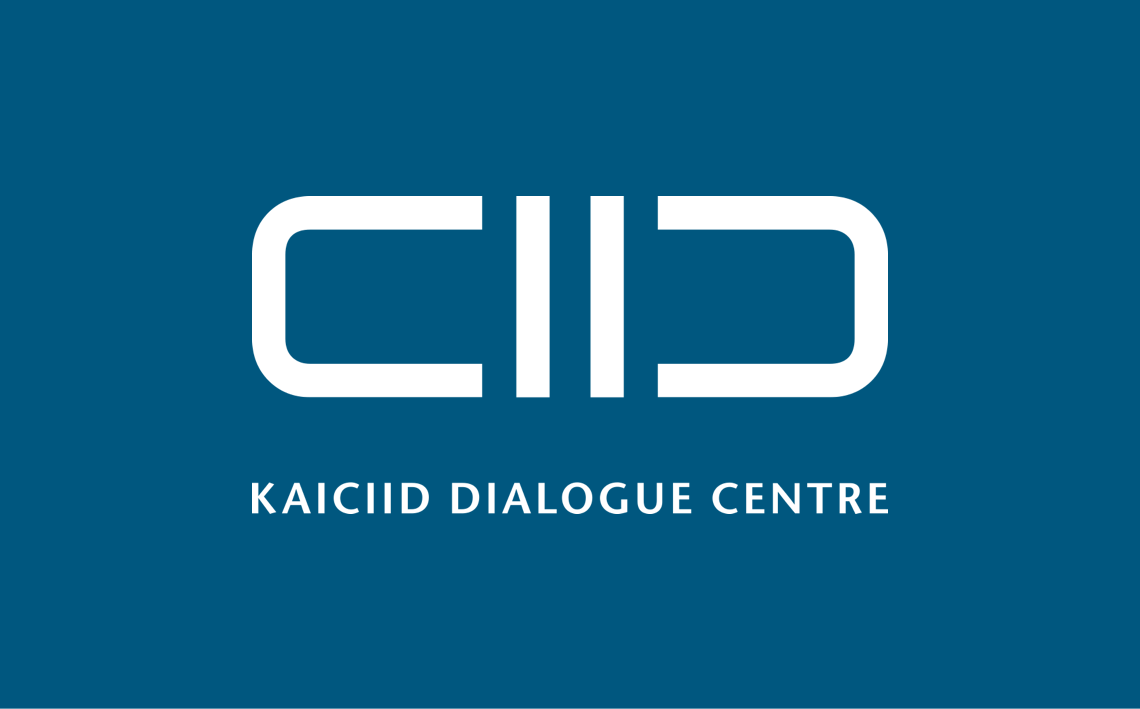 Centering dialog. KAICIID эмблема.