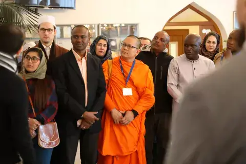Dr. Auwal Farouk Abdussalam visiting houses of worship in Vienna as part of his activity in the KAICIID Fellows Programme (2018)